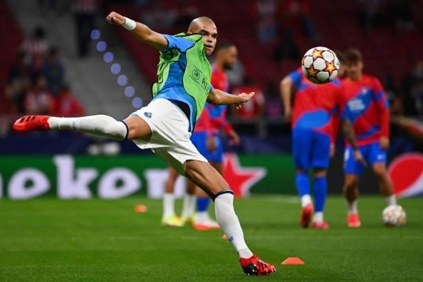 Porto's Portuguese defender Pepe warms up before the UEFA Champions League first round group B football match between Atletico Madrid and Porto at...