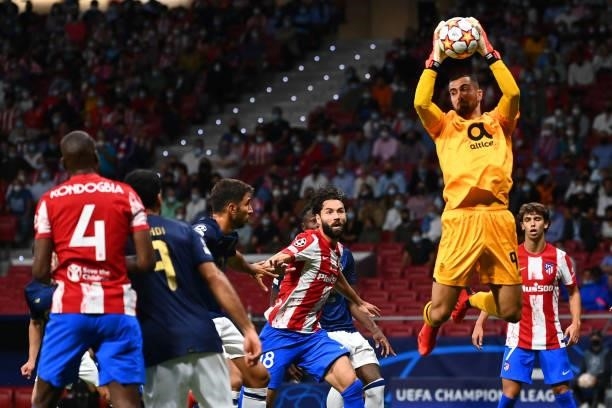 Porto's Portuguese goalkeeper Diogo Costa makes a save during the UEFA Champions League first round group B football match between Atletico Madrid...