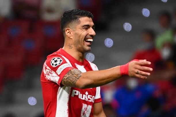 Atletico Madrid's Uruguayan forward Luis Suarez smiles during the UEFA Champions League first round group B football match between Atletico Madrid...