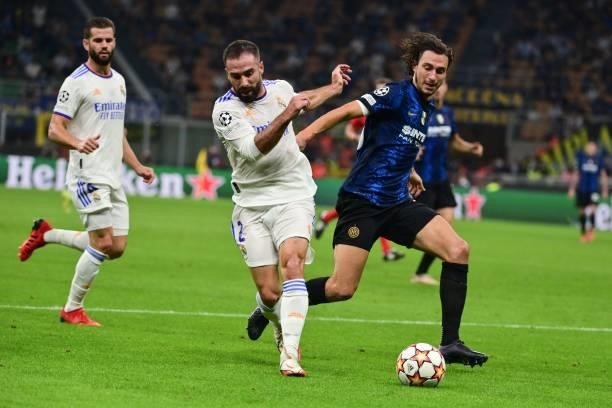 Inter Milan's Italian defender Matteo Darmian challenges Real Madrid's Spanish defender Dani Carvajal during the UEFA Champions League Group D...