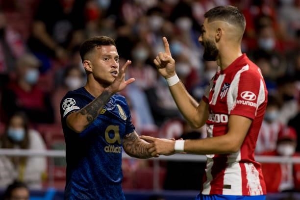 Otavio of FC Porto and Yannick Carrasco of Atletico de Madrid discusses during the UEFA Champions League group B match between Atletico Madrid and FC...