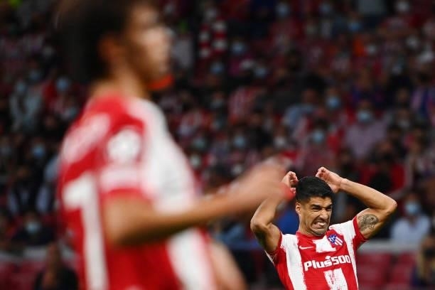 Atletico Madrid's Uruguayan forward Luis Suarez reacts during the UEFA Champions League first round group B football match between Atletico Madrid...