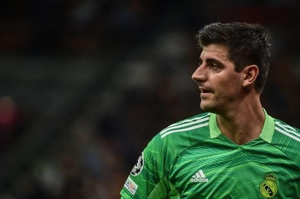 Real Madrid's Belgian goalkeeper Thibaut Courtois looks on during the UEFA Champions League Group D football match between Inter Milan and Real...