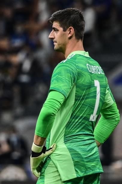 Real Madrid's Belgian goalkeeper Thibaut Courtois reacts during the UEFA Champions League Group D football match between Inter Milan and Real Madrid...