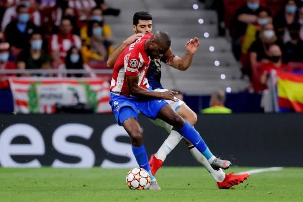 Geoffrey Kondogbia of Atletico Madrid, Diogo Leite of FC Porto during the UEFA Champions League match between Atletico Madrid v FC Porto at the...