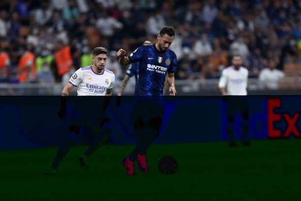 Hakan Calhanoglu of FC Internazionale controls the ball during the UEFA Champions League group D match between Inter and Real Madrid at Giuseppe...