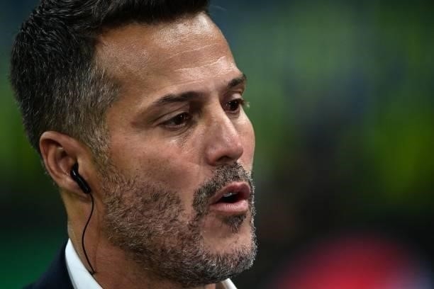 Former Brazilian goalkeeper turned television commentator, Julio Cesar is pictured prior to the UEFA Champions League Group D football match between...