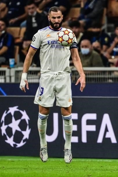 Real Madrid's French forward Karim Benzema chest controls the ball during the UEFA Champions League Group D football match between Inter Milan and...