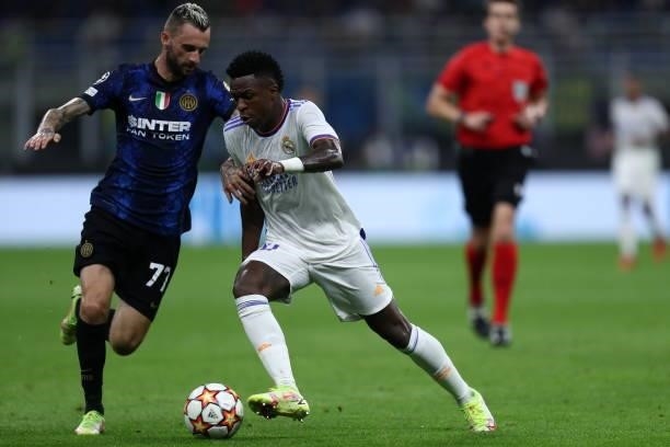 Marcelo Brozovic of FC Internazionale and Vinicius Junior of Real Madrid CF battle for the ball during the UEFA Champions League group D match...