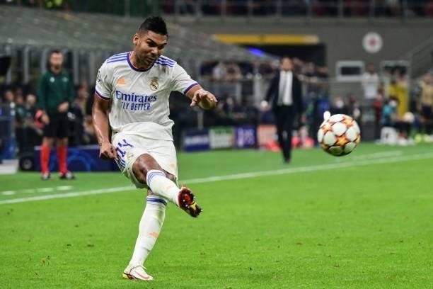 Real Madrid's Brazilian midfielder Casemiro centres the ball during the UEFA Champions League Group D football match between Inter Milan and Real...