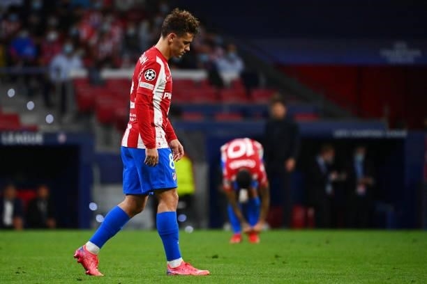 Atletico Madrid's Spanish midfielder Antoine Griezmann reacts during the UEFA Champions League first round group B football match between Atletico...