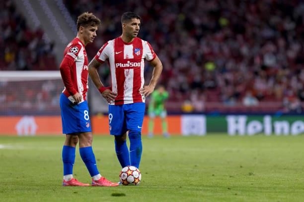 Antoine Griezmann of Atletico de Madrid and Luis Suarez of Atletico de Madrid look before the free kick during the UEFA Champions League group B...