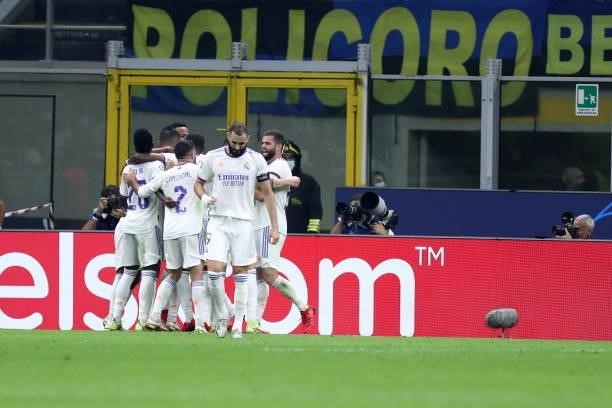 Rodrygo Goes of Real Madrid CF celebrates after scoring his team's first goal with team mates during the UEFA Champions League group D match between...
