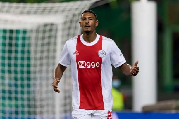 Sebastian Haller of Ajax Amsterdam celebrates after scoring his team's fifth goal during the UEFA Champions League group C match between Sporting CP...