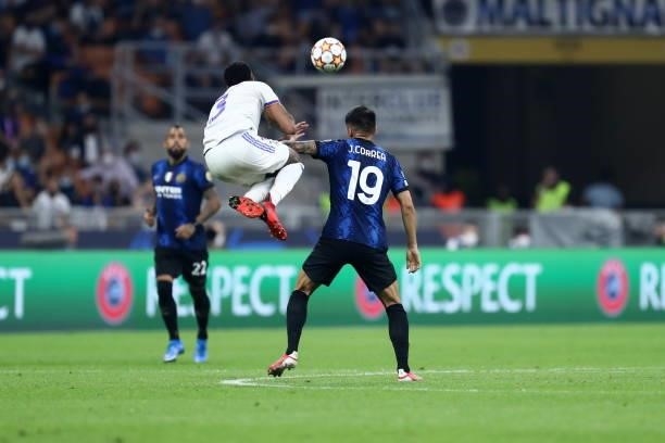 Joaquin Correa of FC Internazionale and Eder Militao of Real Madrid CF battle for the ball during the UEFA Champions League group D match between...