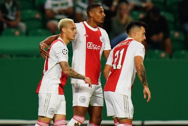 Sebastien Haller of AFC Ajax celebrates with teammates after scoring a goal during the Group C - UEFA Champions League match between Sporting CP and...