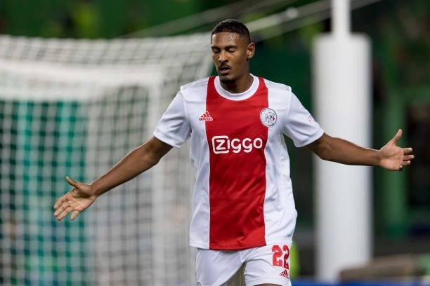 Sebastian Haller of Ajax Amsterdam celebrates after scoring his team's fifth goal during the UEFA Champions League group C match between Sporting CP...
