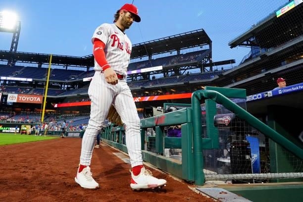 Bryce Harper of the Philadelphia Phillies walks to the dugout before the game between the Chicago Cubs and the Philadelphia Phillies at Citizens Bank...