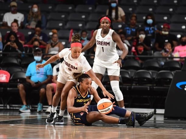 Odyssey Sims of the Atlanta Dream and Aaliyah Wilson of the Indiana Fever fight for the ball during the game on September 14, 2021 at Gateway Center...