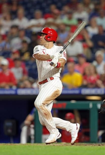 Realmuto of the Philadelphia Phillies hits an RBI single in the fifth inning during a game against the Chicago Cubs at Citizens Bank Park on...