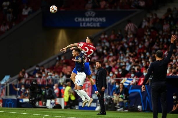 Mario Hermoso and Otavio during UEFA Champions League match between Atletico de Madrid and FC Porto at Wanda Metropolitano on September 15, 2021 in...