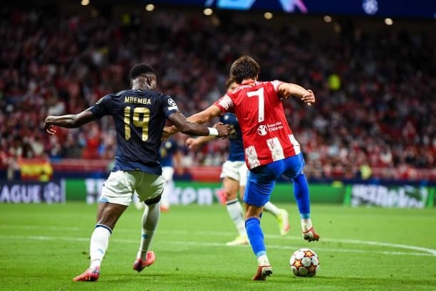Joao Felix and Mbemba during UEFA Champions League match between Atletico de Madrid and FC Porto at Wanda Metropolitano on September 15, 2021 in...