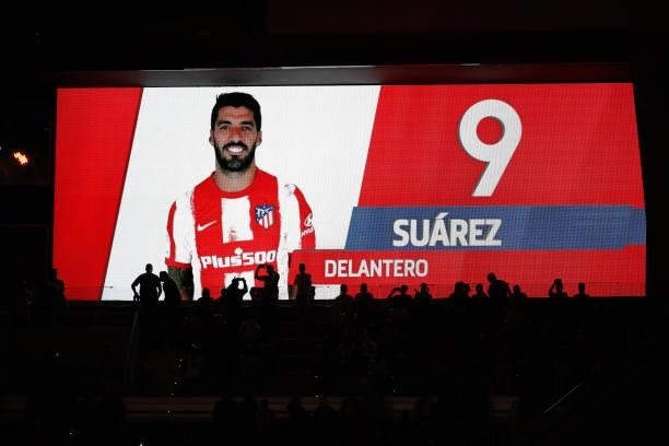 Video scoreboard with suporters during the UEFA Champions League match between Atletico de Madrid and FC Porto at Wanda Metropolitano in Madrid,...