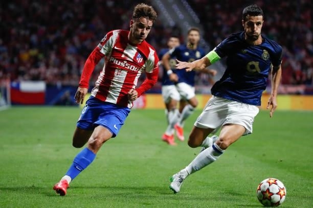 Antoine Griezmann of Atletico de Madrid in action with Ivan Marcano of FC Porto during the UEFA Champions League match between Atletico de Madrid and...