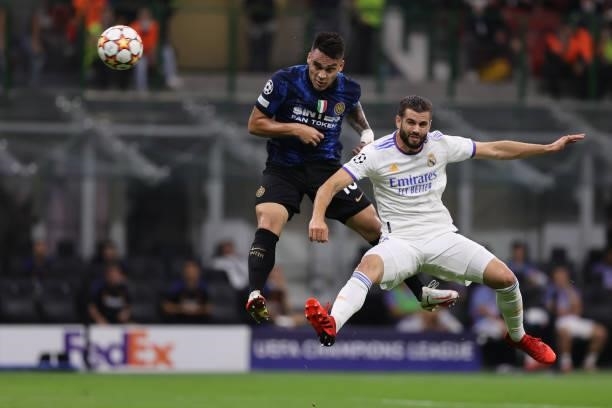 Lautaro Martinez of FC Internazionale fights for the ball against Nacho Fernandez of Real Madrid CF during the UEFA Champions League 2021/22 Group...