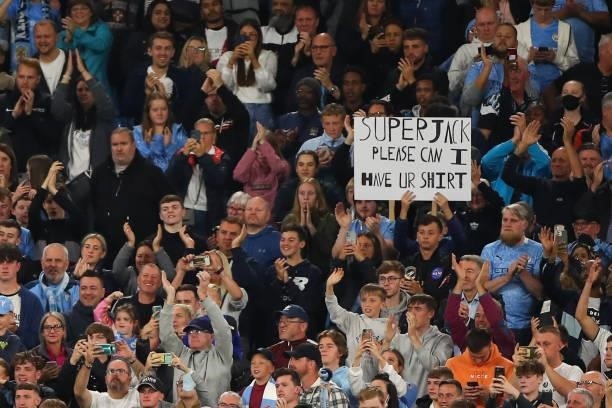 Fans of Manchester City hold up a banner for Jack Grealish of Manchester City reading Super Jack during the UEFA Champions League group A match...