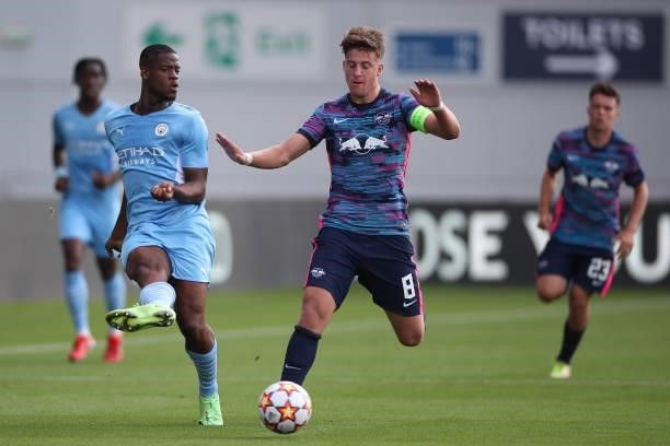 Luke Mbete of Manchester City and Ben Klefisch of RB Leipzig during the UEFA Youth League match between Manchester City and RB Leipzig at Manchester...