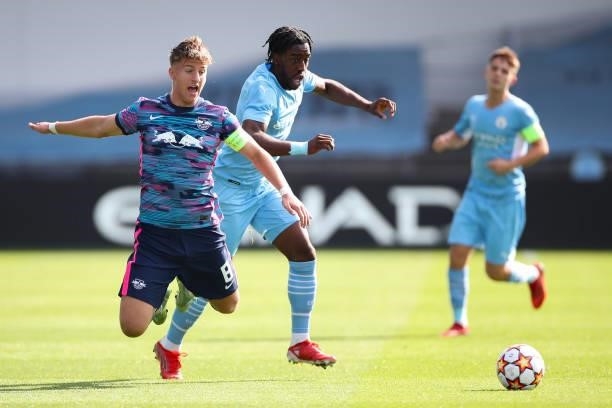 Ben Klefisch of RB Leipzig and Joshua Wilson-Esbrand of Manchester City during the UEFA Youth League match between Manchester City and RB Leipzig at...