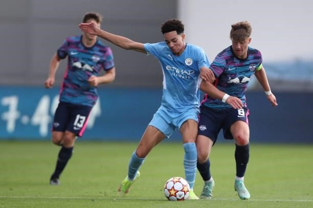 Sam Edozie of Manchester City and Ben Klefisch of RB Leipzig during the UEFA Youth League match between Manchester City and RB Leipzig at Manchester...