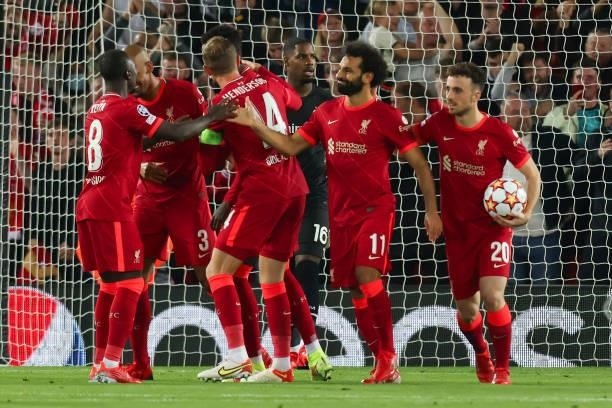 Mohamed Salah of Liverpool FC celebrates after scoring his team's second goal during the UEFA Champions League group B match between Liverpool FC and...