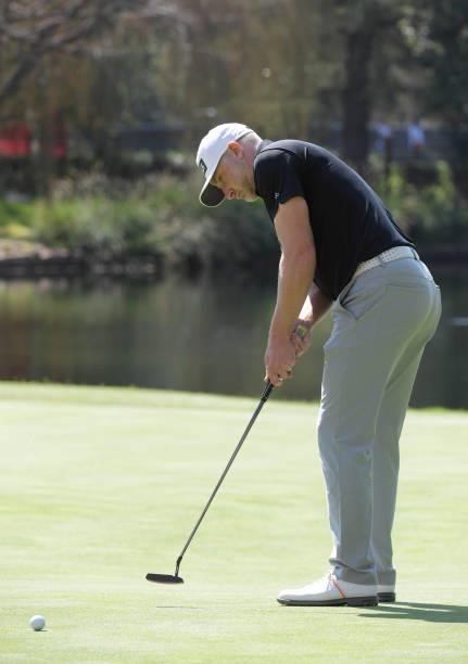 David Skinns of England hits a putt on the 11th green during the first round of the Fortinet Championship at Silverado Resort and Spa North on...