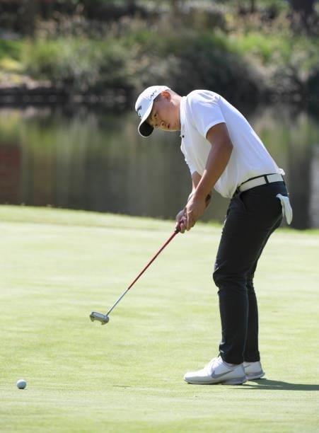Kevin Yu hits a putt on the 11th green during the first round of the Fortinet Championship at Silverado Resort and Spa North on September 16, 2021 in...