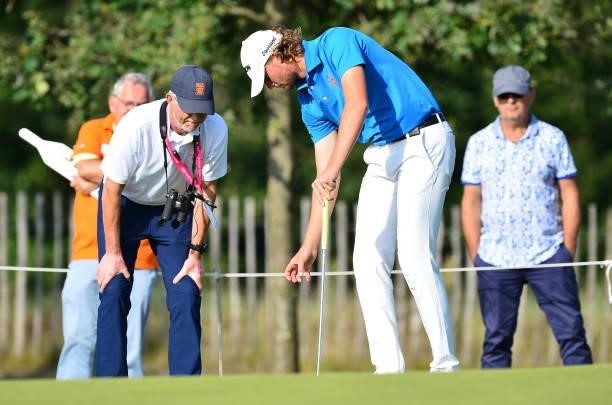 Kiet Van Der Weele of Netherlands sparks with a referee at the 11th hole during Day Two of the Dutch Open at Bernardus Golf on September 17, 2021 in...