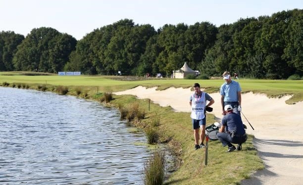 Ben Evans of England speaks with a referee at the 7th hole during Day Two of the Dutch Open at Bernardus Golf on September 17, 2021 in Cromvoirt,...