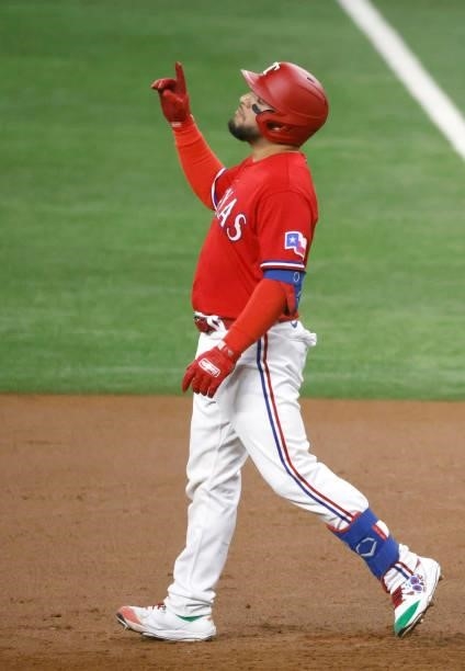 Jose Trevino of the Texas Rangers reacts after hitting a single against the Chicago White Sox during the second inning at Globe Life Field on...