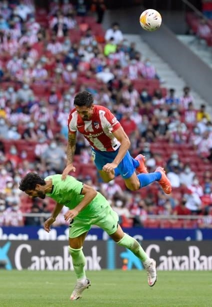 Athletic Bilbao's Spanish midfielder Raul Garcia vies with Atletico Madrid's Montenegrin defender Stefan Savic during the Spanish League football...