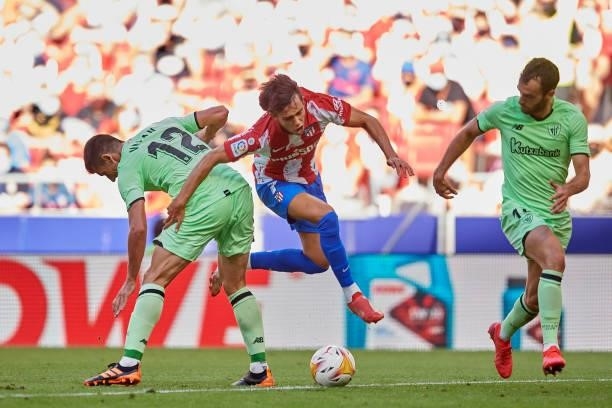 Joao Felix of Atletico Madrid and Dani Vivian of Athletic compete for the ball during the La Liga Santander match between Club Atletico de Madrid and...