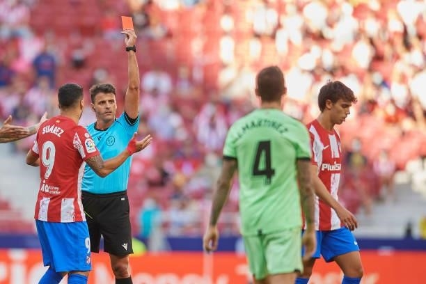 Joao Felix of Atletico Madrid is shown a red card by the referee Gil Manzano during the La Liga Santander match between Club Atletico de Madrid and...