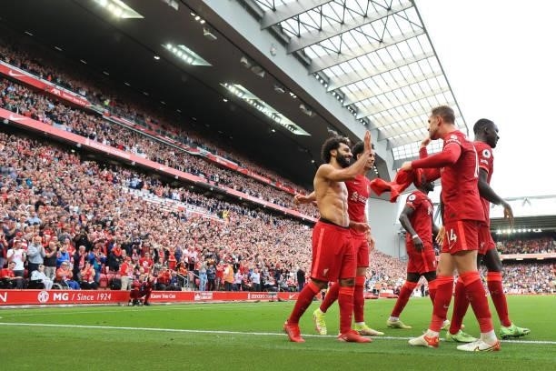General view as Mohamed Salah of Liverpool celebrates with his teammates after scoring their 2nd goal during the Premier League match between...