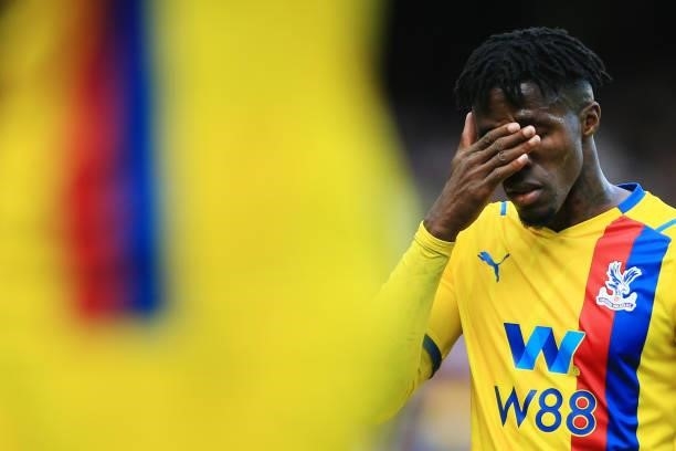 Wilfried Zaha of Crystal Palace looks dejected during the Premier League match between Liverpool and Crystal Palace at Anfield on September 18, 2021...