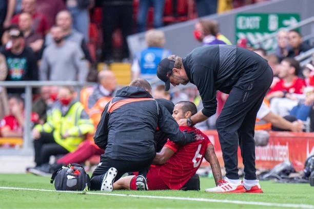 Manager Jürgen Klopp of Liverpool and injured Thiago during the Premier League match between Liverpool and Crystal Palace at Anfield on September 18,...