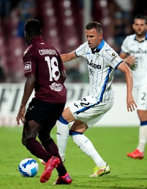 Josip Ilicic of Atalanta BC competes for the ball with Lassana Coulibaly of US Salernitana in action ,during the Serie A match between US Salernitana...