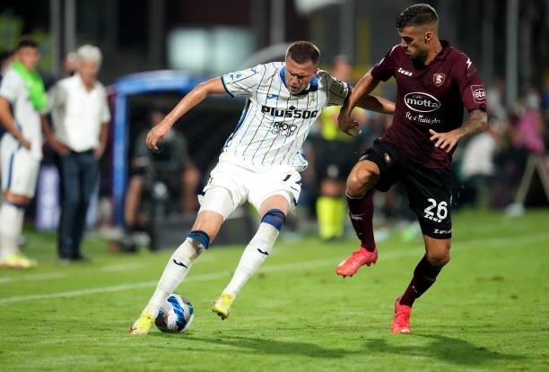 Josip Ilicic of Atalanta BC competes for the ball with Luka Bogdan of US Salernitana in action ,during the Serie A match between US Salernitana v...
