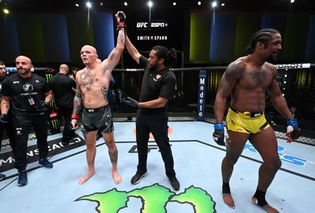 In this handout photo provided by UFC, Anthony Smith reacts after his victory over Ryan Spann in a light heavyweight fight during the UFC Fight Night...