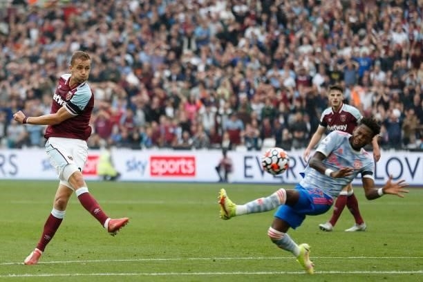 West Ham United's Czech midfielder Tomas Soucek shoots over during the English Premier League football match between West Ham United and Manchester...