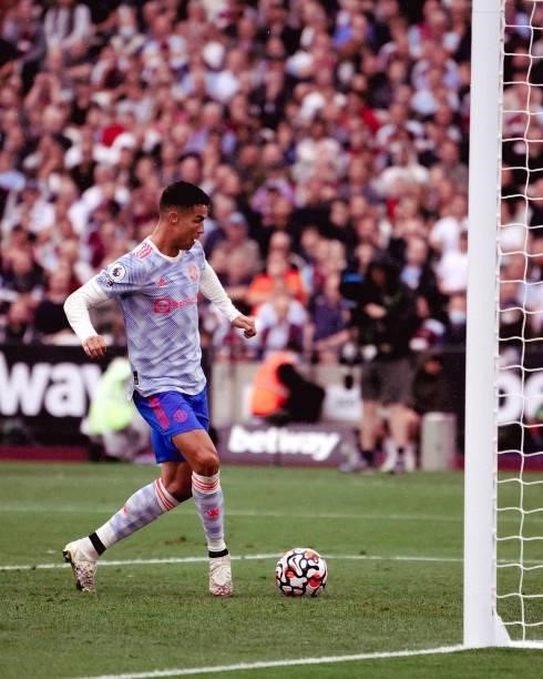 Cristiano Ronaldo of Manchester United scores a goal to make the score 1-1 during the Premier League match between West Ham United and Manchester...